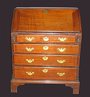 SOLD  A SCARCE 30” CHIPPENDALE SLANT-LID DESK IN MAHOGANY