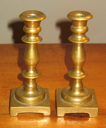 Metalware<br>Archives<br>Pair of 18th century brass tapersticks.