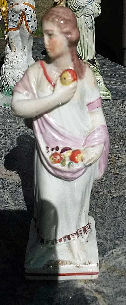Ceramics<br>19th Century<br>Figure of Girl with fruit