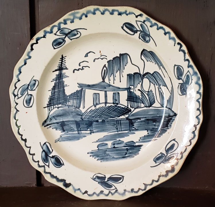 Ceramics<br>18th Century<br>Creamware plate with Chinese House Decoration