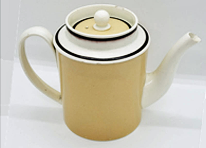 Just In<br>Creamware teapot with slip decoration