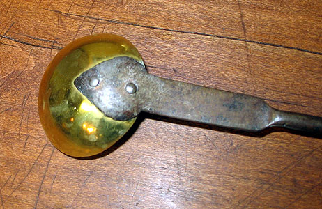 Metalware<br>Archives<br>SOLD  A Brass and Iron Tasting Spoon