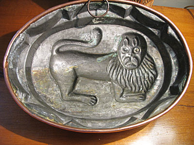 Metalware<br>Archives<br>SOLD  A Rare Copper Lion Mold