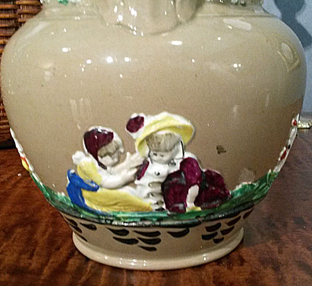 Ceramics<br>Ceramics Archives<br>SOLD  Sprigged jug in merry colors.
