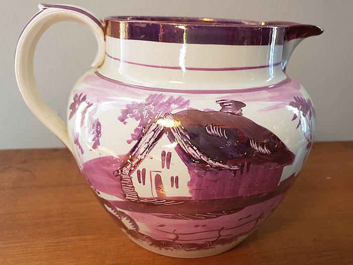Ceramics<br>19th Century<br>Pink Lustre Cottage Jug with a Surprise