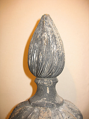 SOLD   A Spectacular Pair of Flame-top Carved Urns