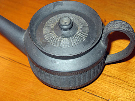 Ceramics<br>Ceramics Archives<br>SOLD  One cup, or toy sized, engine turned basalt teapot