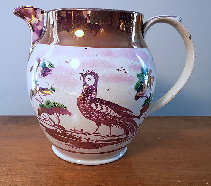 Ceramics<br>19th Century<br>Pink lustre jug with bird