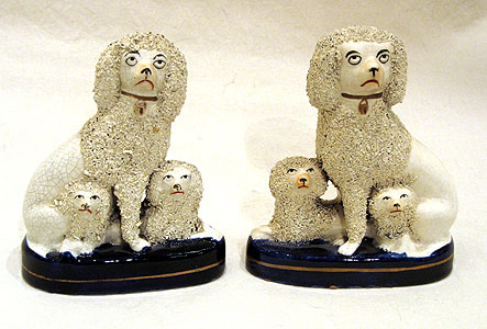 Ceramics<br>Ceramics Archives<br>SOLD A Pair of Staffordshire Poodles wtih Puppies