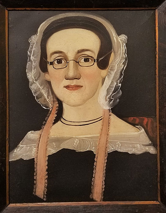 Paintings<br>Archives<br>Portrait of a lady wearing glasses.