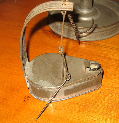 Metalware<br>Archives<br>SOLD  Tin Betty Lamp Stand