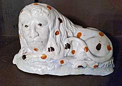 Creamware lion with spots